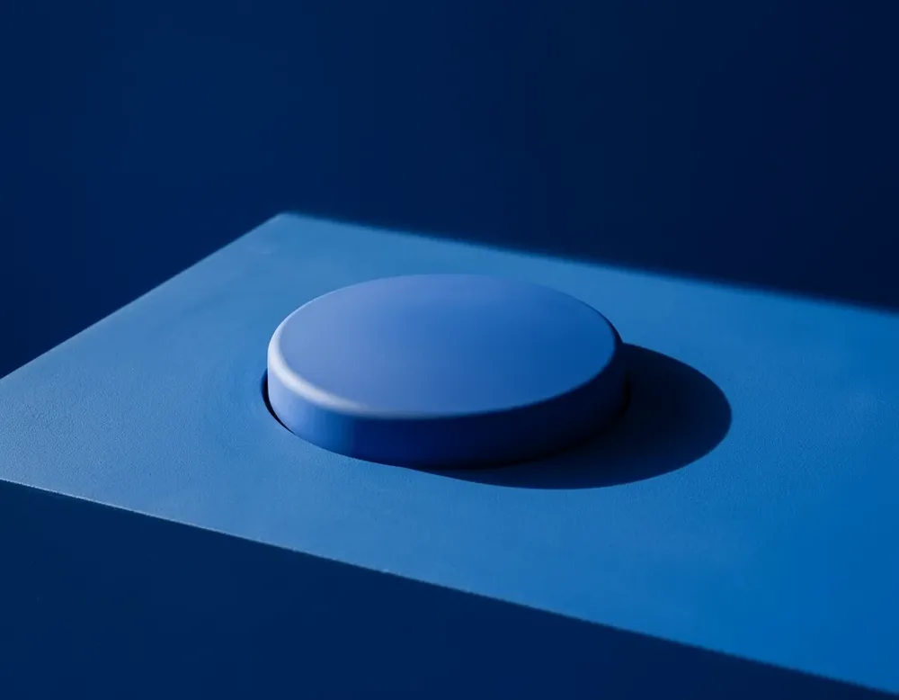 A cobalt button seen from its edge